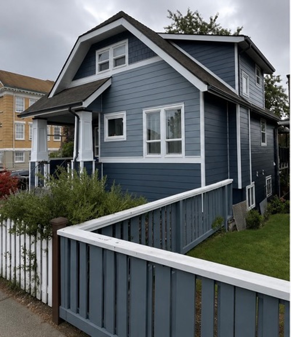 The same home finished with new siding